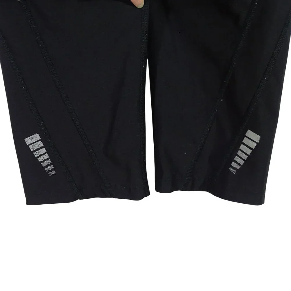 Xersion Black Cropped Athletic Leggings Women Size M Zippered Pocket Reflective